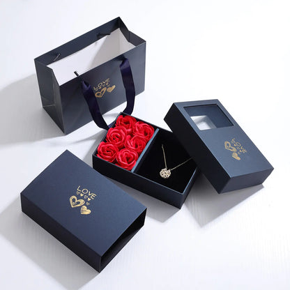 Rose Gift Box featuring the exquisite Four-Leaf Grass Necklace and Heart Necklace